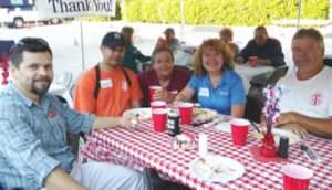 Neuse staff members enjoy the 50+year celebration in May. From left to right, they include: Juan Sauceda, Carlos Rodriguez, Randy Helton, Betty King, and Tim Billings.