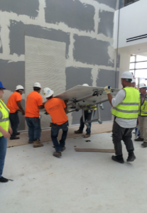 DAC used ETM equipment and MAPEI Ultralite S2 mortar to affix the large porcelain panels to the wall.