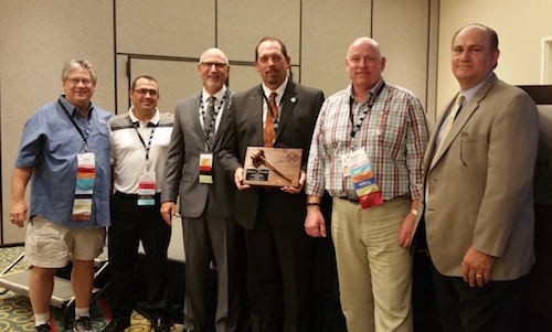 Left to right: board advisors John Cox and Dan Welch, incoming President Martin Howard, outgoing President James Woelfel, incoming 2nd Vice President Martin Brookes, and incoming 1st Vice President Chris Walker.